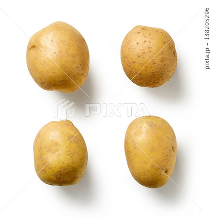 Four whole fresh potatoes isolated on white background, top view 138205296