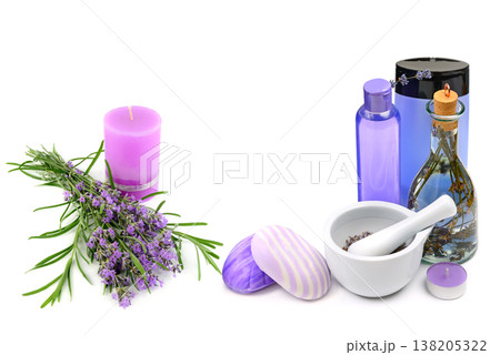 Lavender spa and aromatherapy set with purple candles, essential oils, handmade soap, and fresh flowers isolated on a white background, horizontal orientation, relaxation and wellness concept. Lavender spa and aromatherapy set with purple candles, essential oils, handmade soap, and fresh flowers isolated on a white background, horizontal orientation, relaxation and wellness concept. 138205322