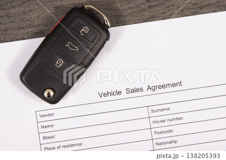 Car key and vehicle sales agreement. Sales, purchases of automobile. Transportation 138205393