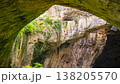 Massive Limestone Archways and Natural Light Inside Devetashka Cave 138205570