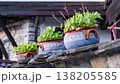 Traditional Painted Ceramic Pots on Stone Tiled Rooftop 138205585