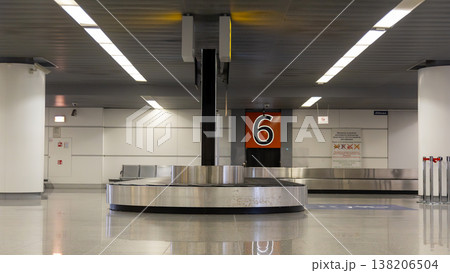 Row of airport luggage carts with blue handles Row of airport luggage carts with blue handles 138206504