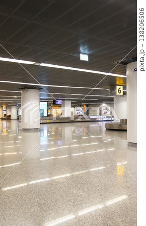 Row of airport luggage carts with blue handles Row of airport luggage carts with blue handles 138206506
