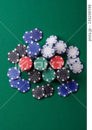 Multicolored casino chips as a conceptual backdrop for gambling games. Multicolored casino chips Multicolored casino chips as a conceptual backdrop for gambling games. Multicolored casino chips 138206596