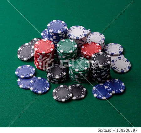 Multicolored casino chips as a conceptual backdrop for gambling games. Multicolored casino chips Multicolored casino chips as a conceptual backdrop for gambling games. Multicolored casino chips 138206597