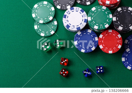 Multicolored casino chips as a conceptual backdrop for gambling games. Multicolored casino chips 138206666
