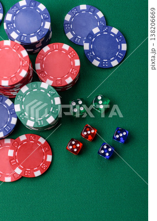 Multicolored casino chips as a conceptual backdrop for gambling games. Multicolored casino chips Multicolored casino chips as a conceptual backdrop for gambling games. Multicolored casino chips 138206669