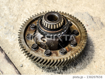 Dismantled box car transmissions. Gear with bearings. The gears on the shaft of a mechanical transmission. Dismantled box car transmissions. Gear with bearings. The gears on the shaft of a mechanical transmission. 138207638
