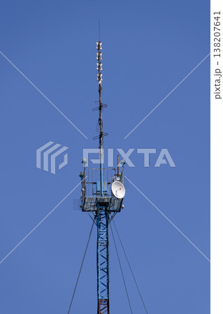 Communication tower with repeaters and satellite dish Communication tower with repeaters and satellite dish 138207641