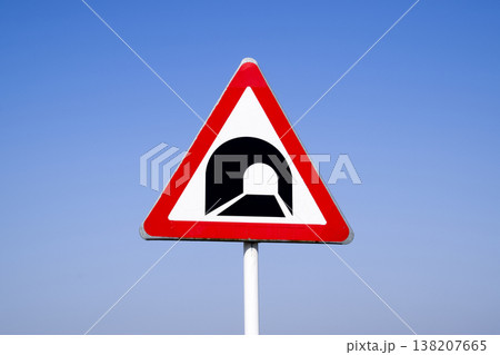 A road sign warning about the tunnel. A road sign warning about the tunnel. 138207665