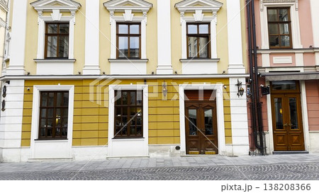 View of historic city architecture feature traditional residential building. Facades display classic design elements, detailed windows and textured walls, capturing cultural heritage urban environment View of historic city architecture feature traditional residential building. Facades display classic design elements, detailed windows and textured walls, capturing cultural heritage urban environment 138208366