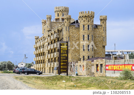 The hotel building, covered with decorative stone. Multi-storey hotel with a decorative trim, which is called Dagestani stone. The hotel building, covered with decorative stone. Multi-storey hotel with a decorative trim, which is called Dagestani stone. 138208553