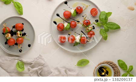 Caprese salad with tomato and mozzarella 138209137