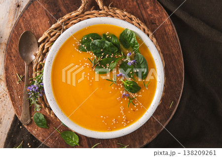 Healthy Roasted Butternut Squash Soup with Spinach and Sesame Seeds 138209261