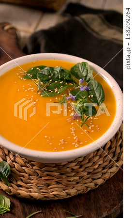 Creamy Pumpkin Soup with Spinach Rosemary and Sesame Seeds Creamy Pumpkin Soup with Spinach Rosemary and Sesame Seeds 138209264