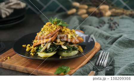 Pan-Seared Tofu with Sauteed Spinach and Potatoes Topped with Herb Crumbles Pan-Seared Tofu with Sauteed Spinach and Potatoes Topped with Herb Crumbles 138209308
