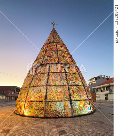 Giant Community Crochet Christmas Tree Illuminated at Twilight Giant Community Crochet Christmas Tree Illuminated at Twilight 138209421