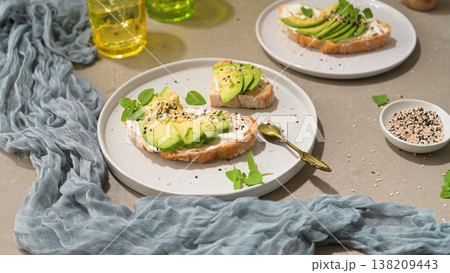 Toast with avocado cream cheese and wheat bread 138209443
