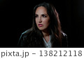 Anxiety And Uncertainty Portrait Of A Concerned Woman With Worried Expression And Dark Hair Against 138212118