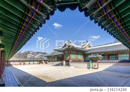 Traditional Korean Architecture Framed by Colorful Dancheong Eaves at Gyeongbokgung Palace. Traditional Korean Architecture Framed by Colorful Dancheong Eaves at Gyeongbokgung Palace. 138214280