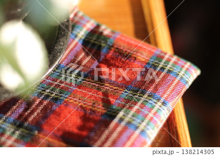 Folded Red Plaid Fabric After Christmas 138214305