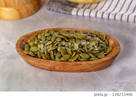 Fresh green pumpkin peeled seeds 138215406