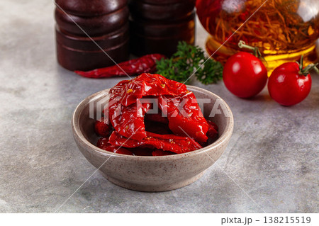 Tasty dried tomatoes in the bowl Tasty dried tomatoes in the bowl 138215519