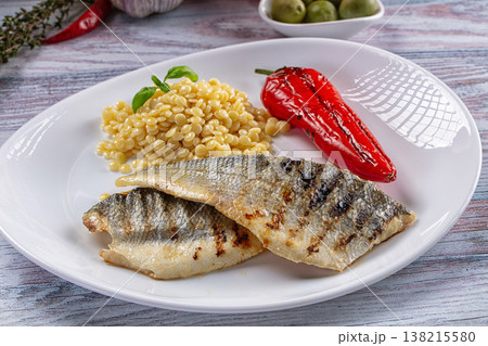 Grilled seabass fillet with ptitim Grilled seabass fillet with ptitim 138215580