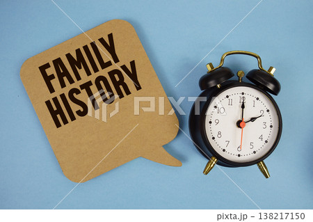 Family History text with alarm clock on blue background Family History text with alarm clock on blue background 138217150