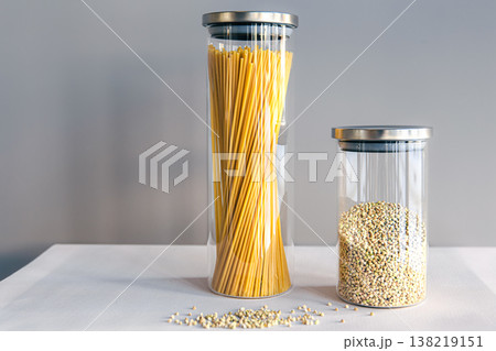 Spaghetti and cereals in glass jars, isolated. Spaghetti and cereals in glass jars, isolated. 138219151
