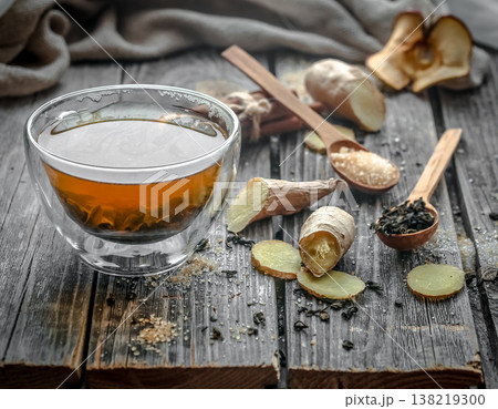 still life with transparent Cup of tea on wooden background still life with transparent Cup of tea on wooden background 138219300