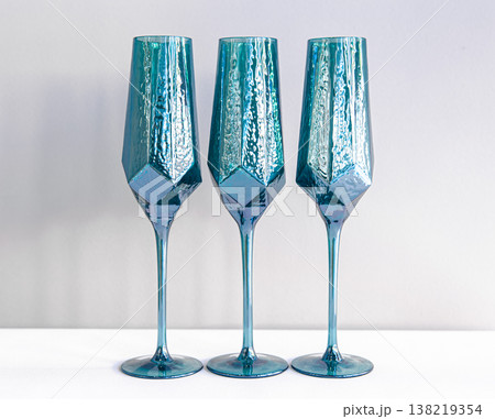 Texture glass goblets on a white background. Texture glass goblets on a white background. 138219354