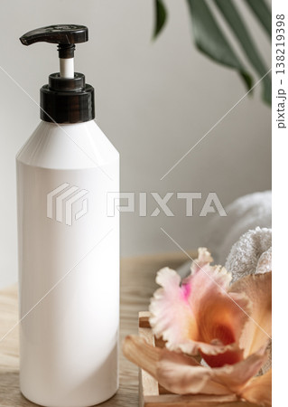 Treatment bottle with dispenser and Thai Orzidea. Treatment bottle with dispenser and Thai Orzidea. 138219398