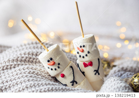 Two happy funny marshmallow snowmen, Christmas winter holiday decoration. Two happy funny marshmallow snowmen, Christmas winter holiday decoration. 138219413