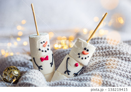 Two happy funny marshmallow snowmen, Christmas winter holiday decoration. Two happy funny marshmallow snowmen, Christmas winter holiday decoration. 138219415