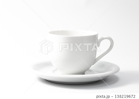 White cup and saucer isolated on white background. 138219672