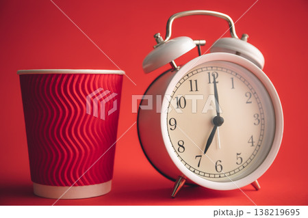 White stylish alarm clock and paper cup, morning concept. 138219695