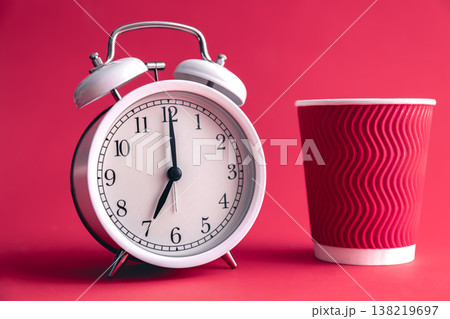 White stylish alarm clock and paper cup, morning concept. 138219697