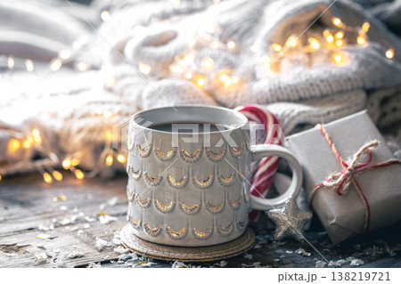 Winter composition with a cup of cocoa and decorative details. Winter composition with a cup of cocoa and decorative details. 138219721