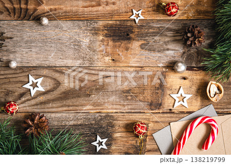 Wooden Christmas background with decor details, flat lay. Wooden Christmas background with decor details, flat lay. 138219799