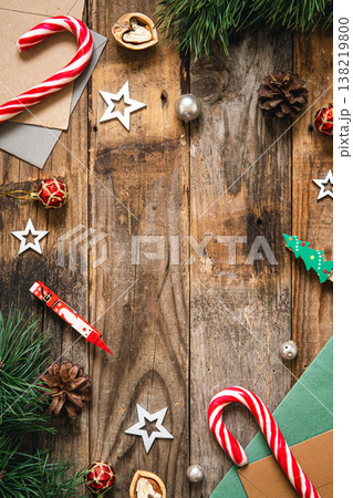 Wooden Christmas background with decor details, flat lay. Wooden Christmas background with decor details, flat lay. 138219800