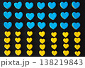 Yellow and blue handmade gingerbread cookies in the shape of hearts. 138219843
