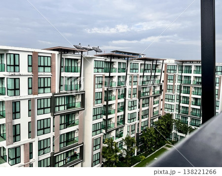 Multi-storey Asian hotel building in a modern style Multi-storey Asian hotel building in a modern style 138221266