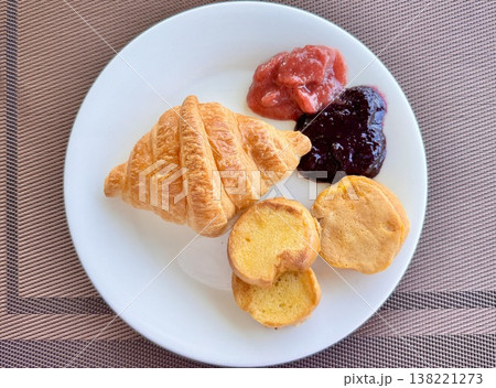 European breakfast croissants with strawberry and blackberry jam and aromatic coffee European breakfast croissants with strawberry and blackberry jam and aromatic coffee 138221273