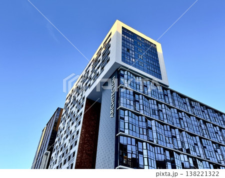 multi-storey modern house on a blue sky background 138221322