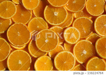 Freshly sliced oranges arranged beautifully for a vibrant summer feast Freshly sliced oranges arranged beautifully for a vibrant summer feast 138224764