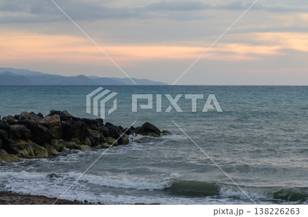 Golden hour over sea and mountains on Cyprus coast 138226263