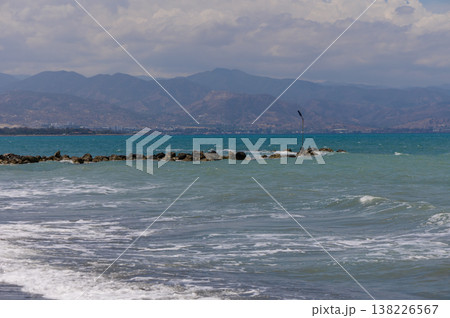 Serene Mediterranean Sea with gentle waves and a spotless blue sky on the coast of Cyprus, perfect for relaxation. Serene Mediterranean Sea with gentle waves and a spotless blue sky on the coast of Cyprus, perfect for relaxation. 138226567