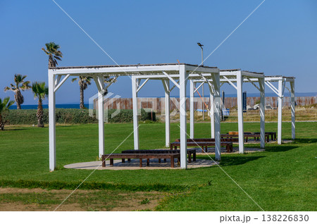 Sunshade Canopies with Beach Loungers at Resort 138226830