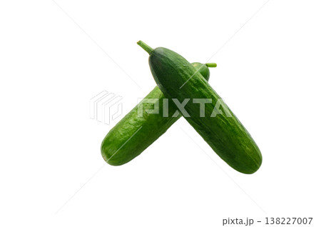 Two fresh mini cucumbers isolated on white Two fresh mini cucumbers isolated on white 138227007